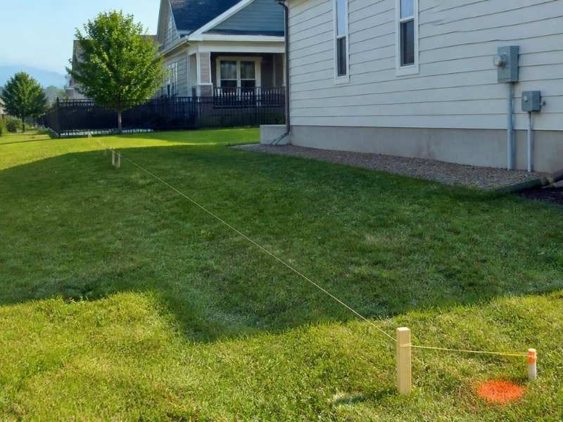 property survey layout showing fence placement stakes for a tall fence project in Chicago Illinois