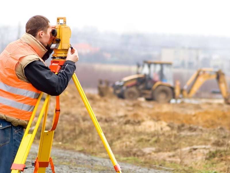 Construction staking survey on an active building site in Chicago, Illinois