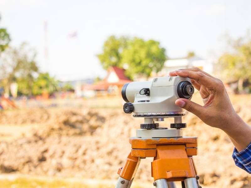 Surveying equipment used for a topographic survey before construction in Chicago Illinois